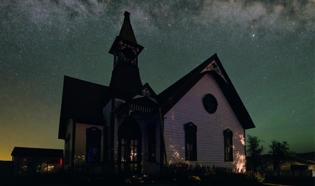 Milky Way over church at night
