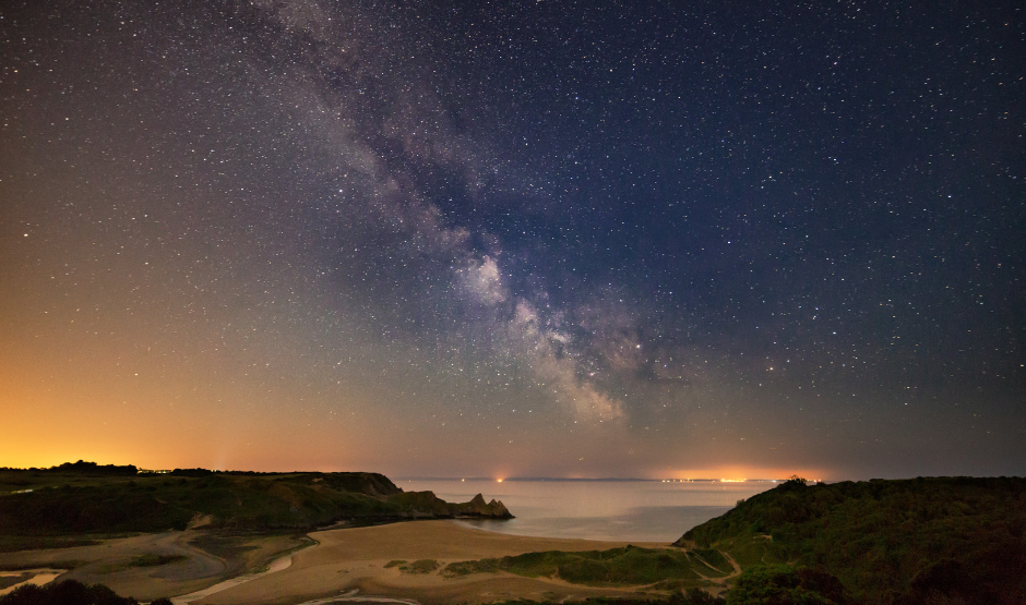 View of the Milky Way from a beach in Wales.